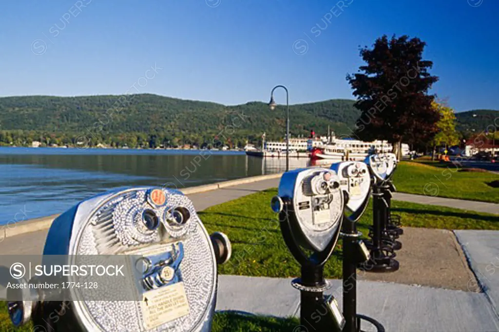 Row of coin-operated binoculars at a Lakeside, Lake George, New York State, USA