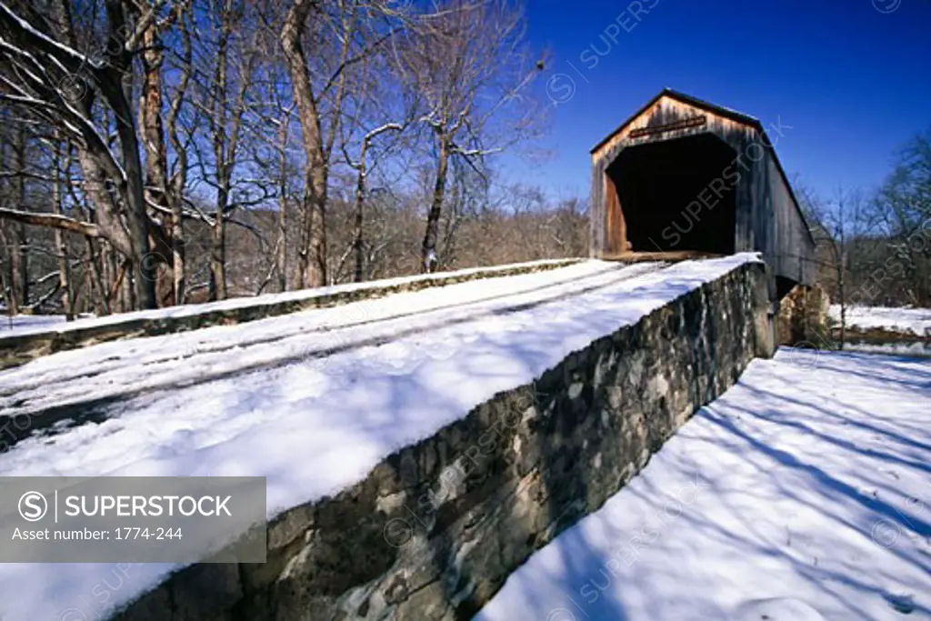 Low angle view of a covered bridge, Schofield Ford Covered Bridge, Tyler State Park, Pennsylvania, USA