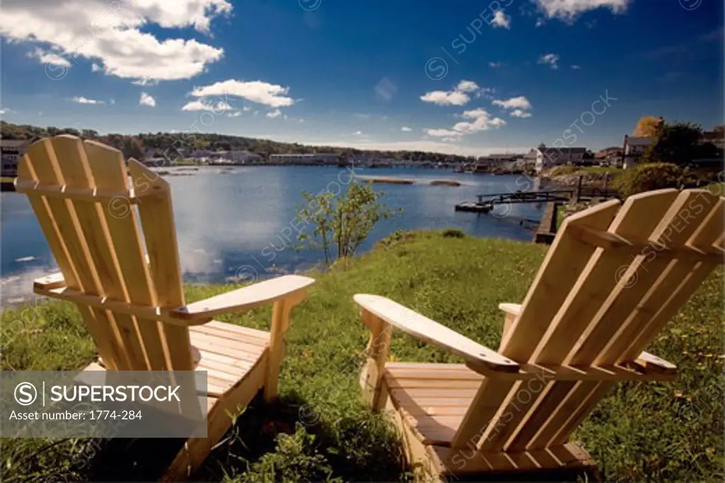 Two empty adirondack chairs, Boothbay Harbor, Maine, USA