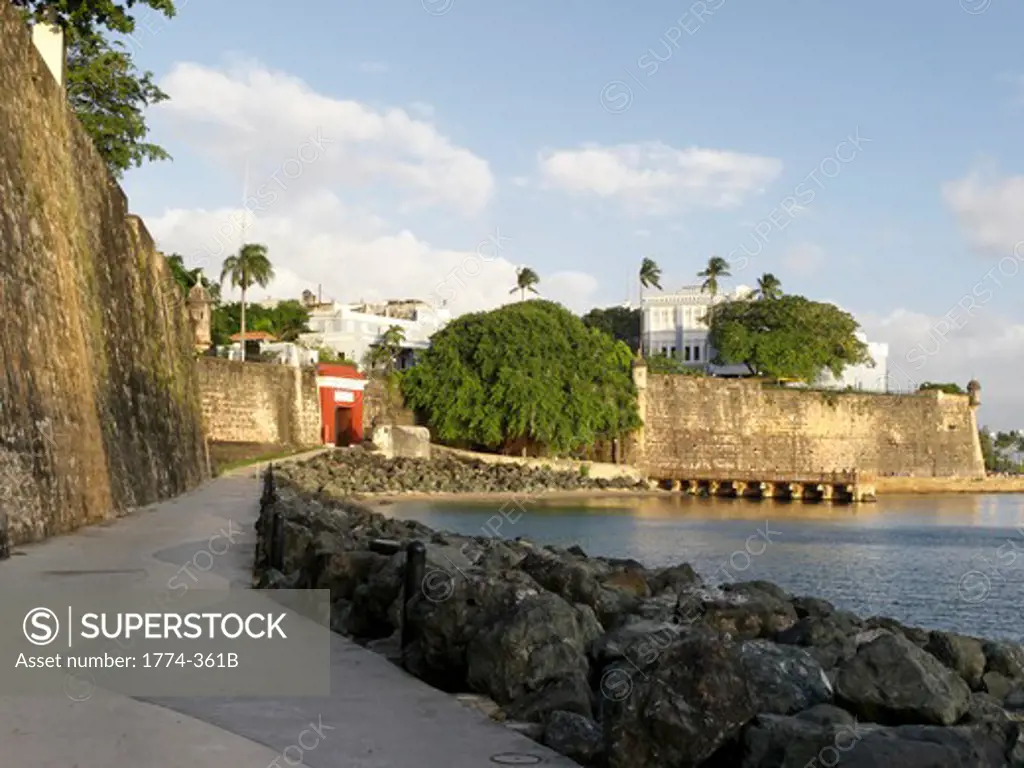 Low Angle View of a Red Gate and City Walls, Paseo Del Morro, Old San Juan, Puerto Rico