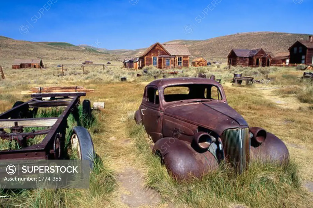 View of Rusting Cars and Mining Equipment, Bodie Ghost Town, California, USA