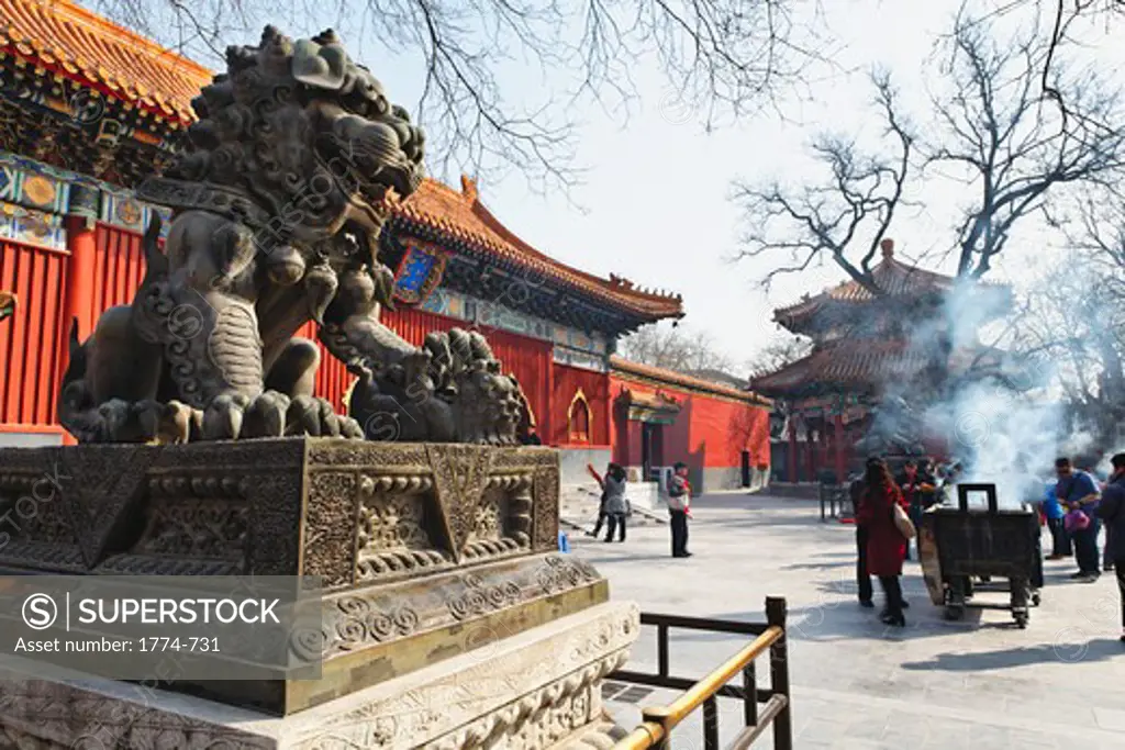 China, Beijing, Female lion sculpture at Hall of Wheel of Law of Yonghegong Lamasery (Lama Temple)