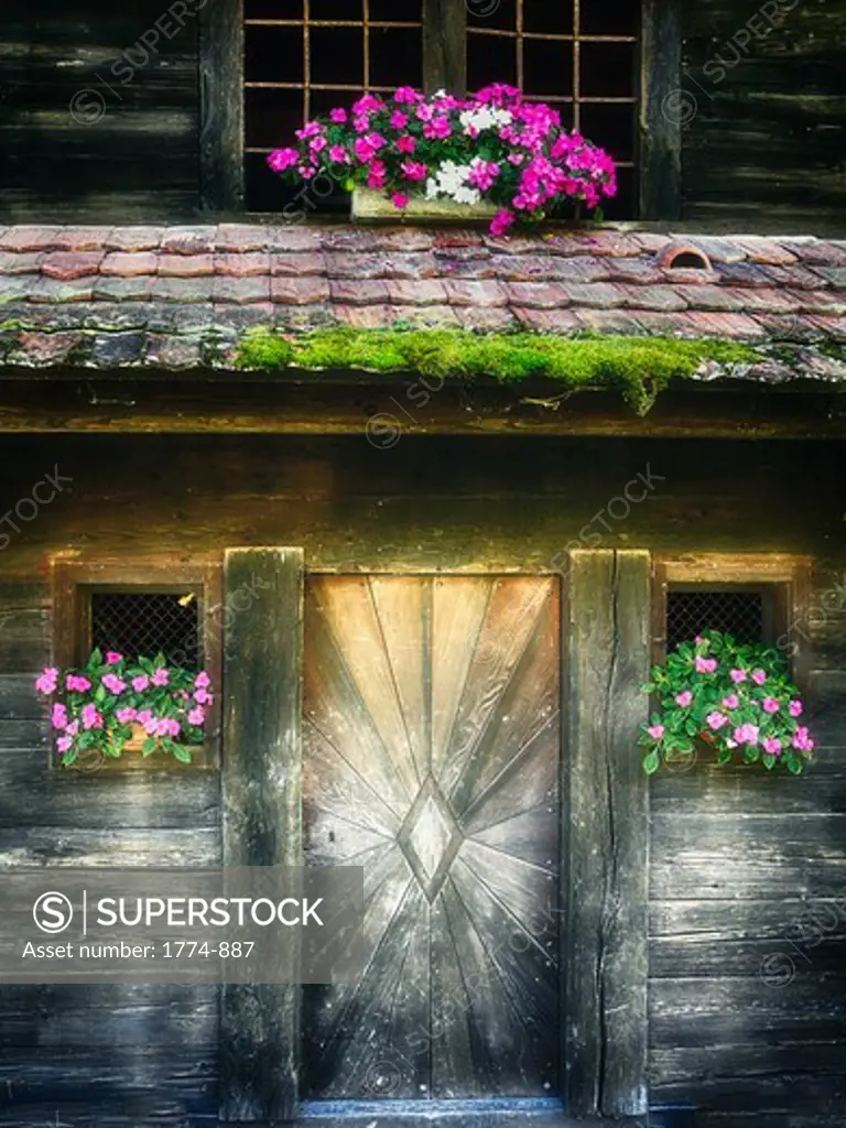 Swiss barn door with flowers, Lucerne, Switzerland