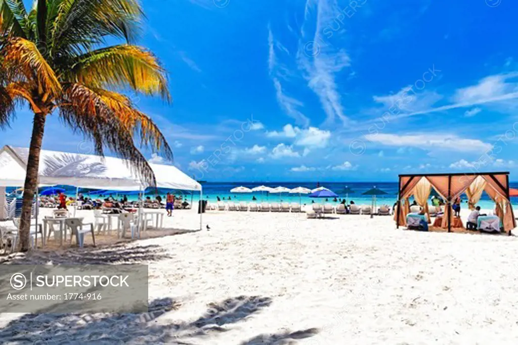 Tourists on the beach, North Beach, Isla Mujeres, Quintana Roo, Yucatan Peninsula, Mexico
