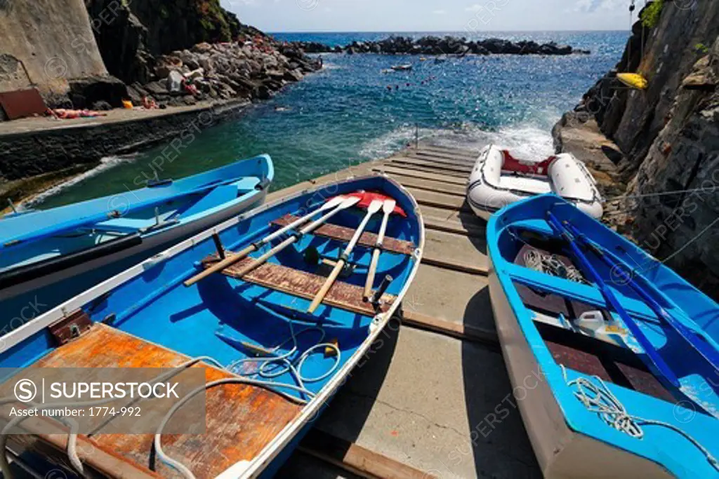 Italy, Liguria, CinqueTerre, Riomaggiore, Colorful boats on ramp