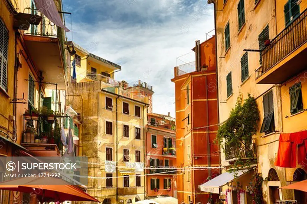 Italy, Liguria, Cinque Terre, Riomaggiore, High angle view of building facades in narrow street