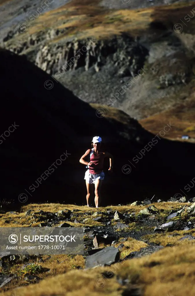 Brandon Sybrowski trail running by headlamp at disk in the adobe hills of teh Gunnison Gorge National Recreation Area and wilder
