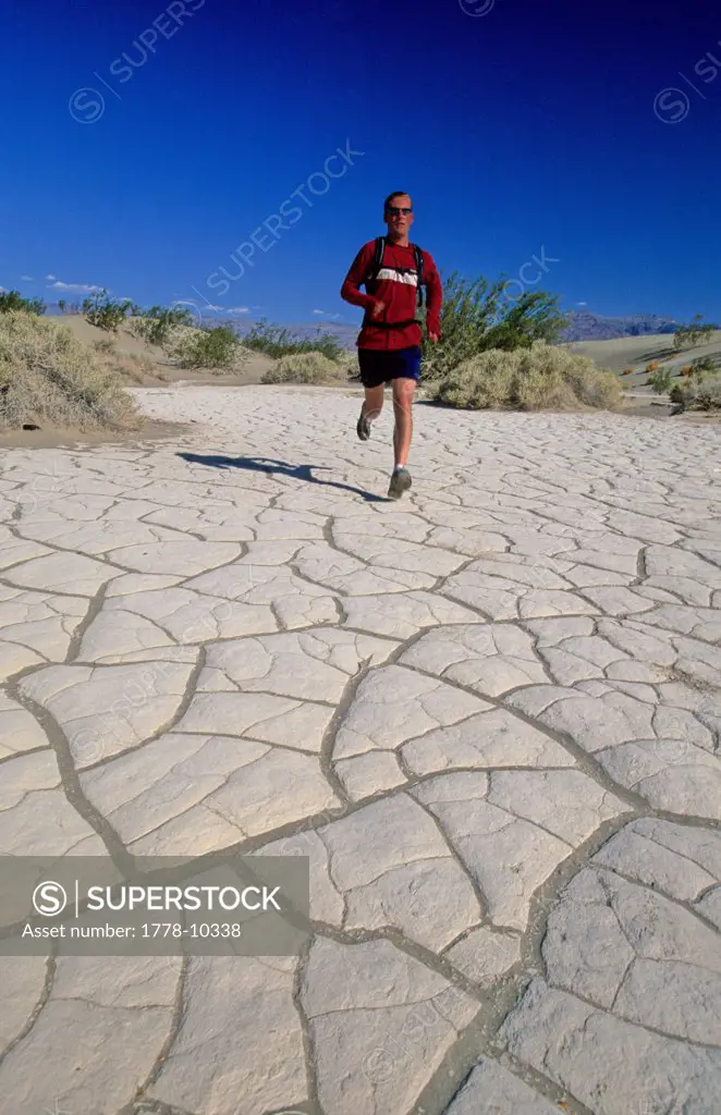 Man trail runs in heat in Death Valley National Park, California
