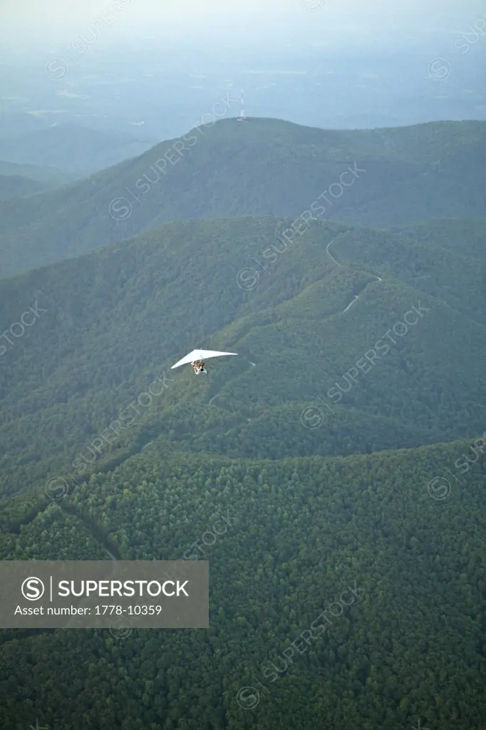 Phil Correll flys his homebuilt ultralight trike south over the mountains on the NC-SC border
