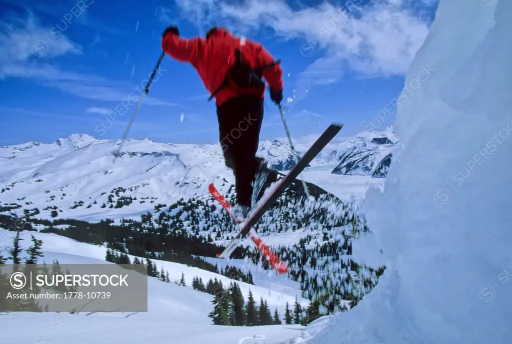 Man telemark skis in Garibaldi Provincial Park, British Columbia, near Whistler (motion blur)