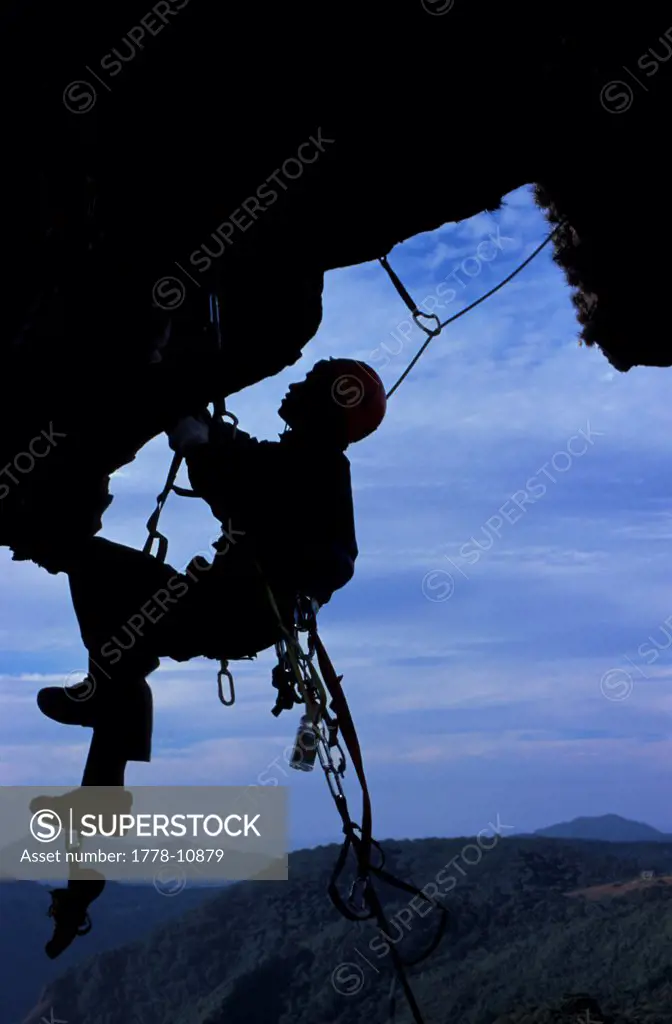 A climber on an overhang