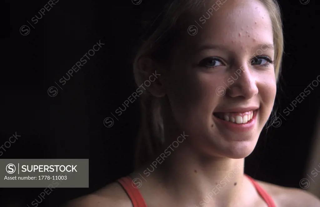 A headshot of a teenage female athlete