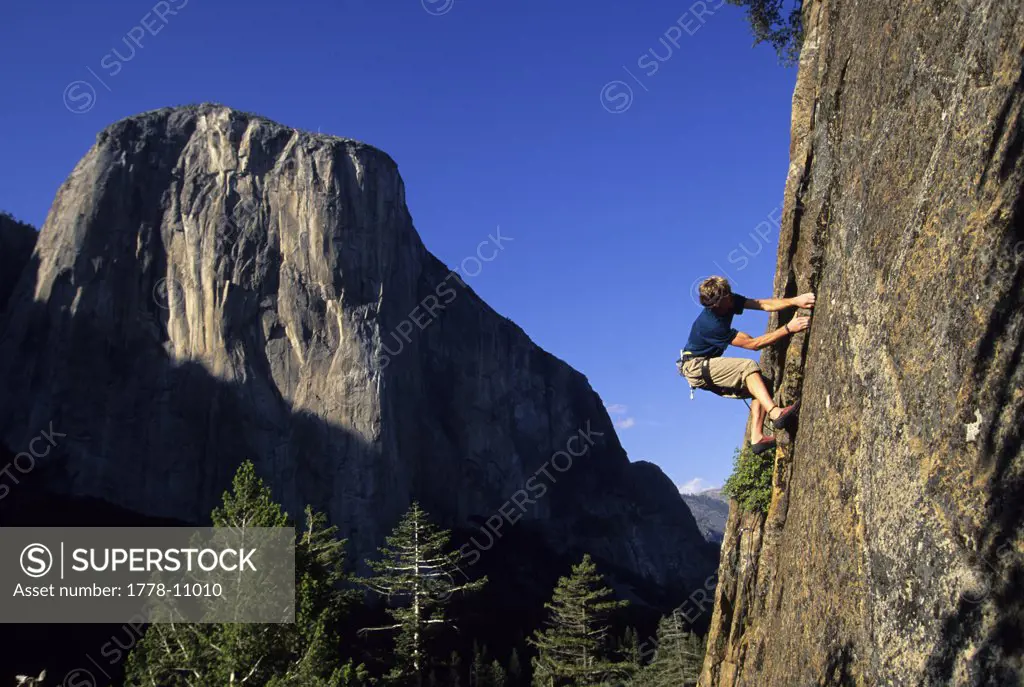 A man climbing in Yosemite