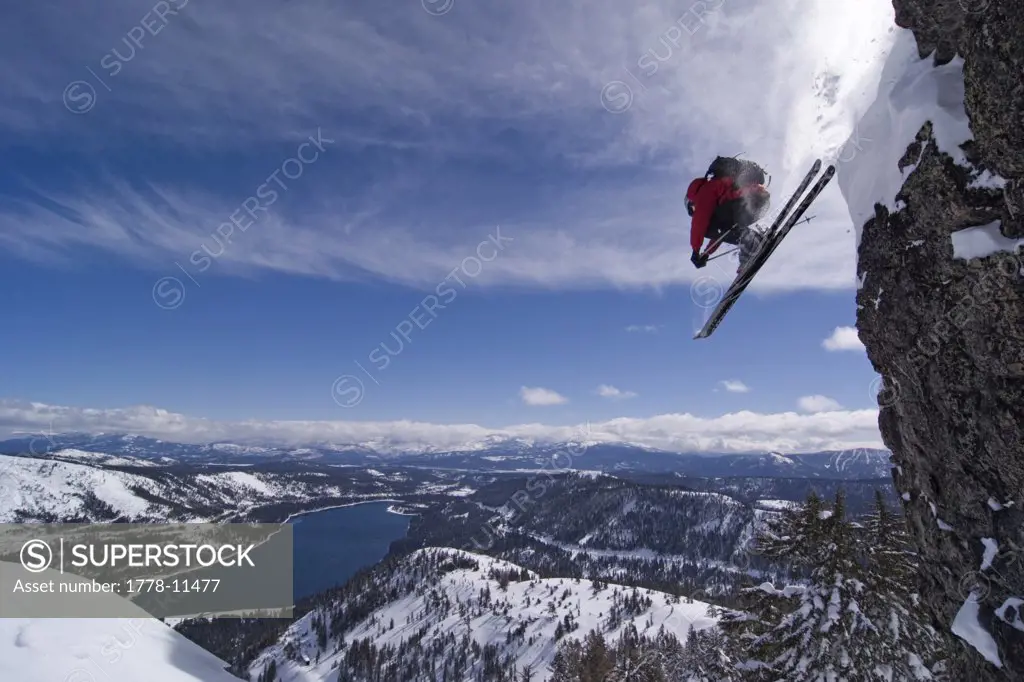 A man skiing off a cliff above Donner Lake California