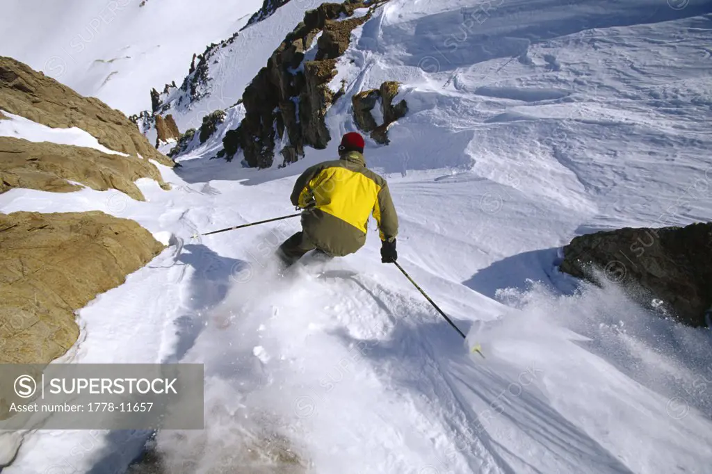 person skiing down narrow shute, Argentina