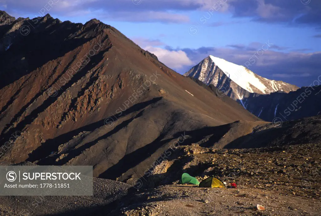 A backpacker campsite on a rocky ridge in the Brooks Range in the Arctic National Wildlife Refuge, Alaska