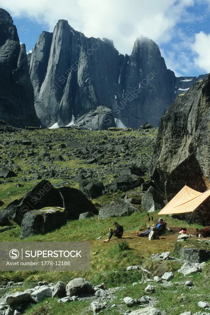 Climbers lounge around on a rest day at camp in Fairy Meadows below the Cirque of the Unclimbables in Canada's Northwest Territo