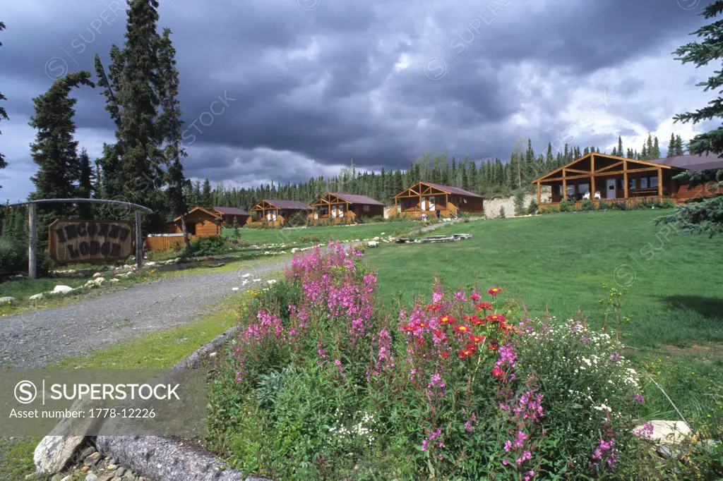 Flowers in front of the main lodge at the Inconnu Lodge on McEvoy Lake in Canada's Yukon Territory