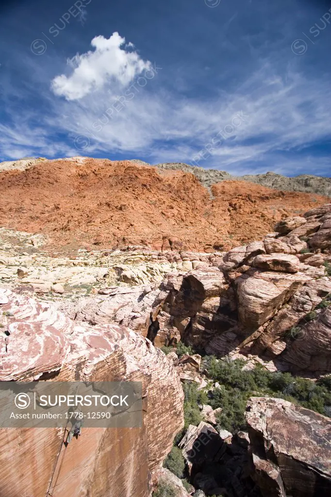 Woman rock climbing, Nevada