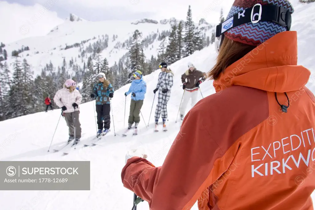 A ski instructor gives a lesson in Kirkwood, California