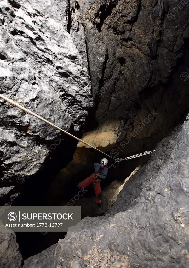 Katie Dent hanging in a shaft underground in the White Mountains on Crete