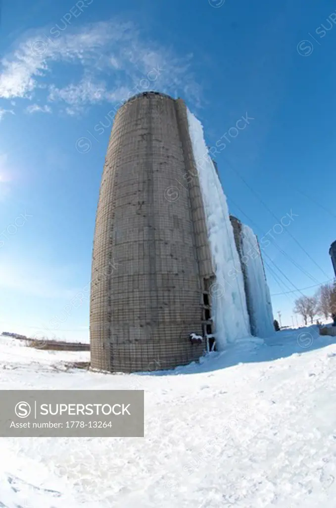 Ice Climbing on farm silos in Iowa