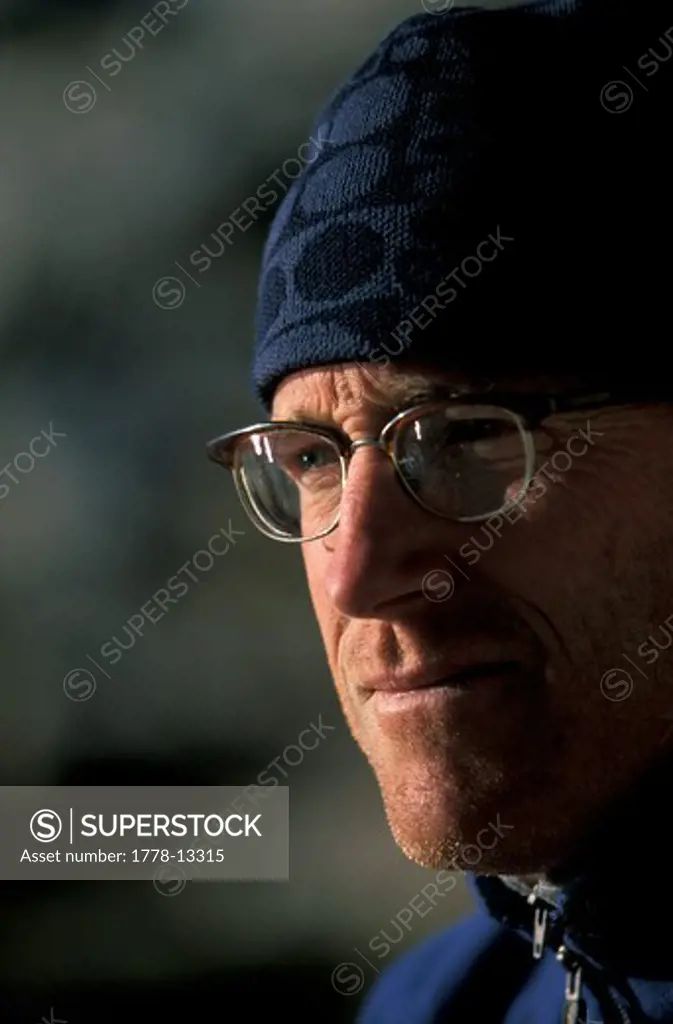 Portrait-headshot of a man wearing a beanie and glasses in Eastern Sierra Nevada mountains, California