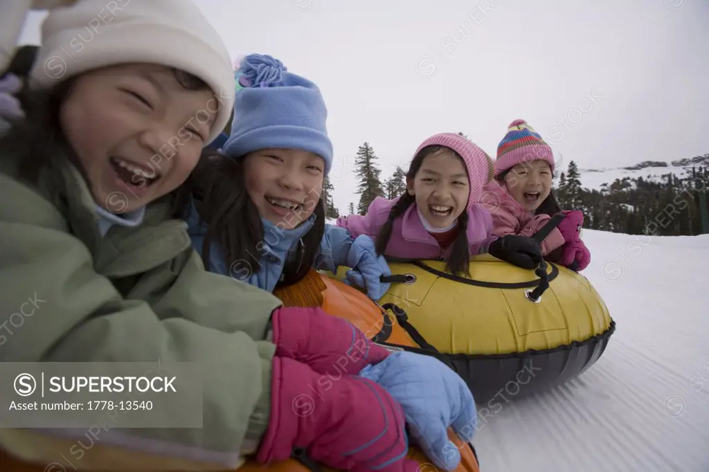 Kids tubing at a ski resort in Kirkwood, California