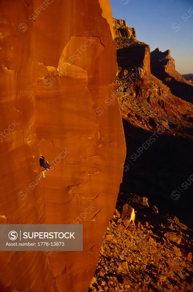 Man rock climbing, San Rafael Swell, Utah