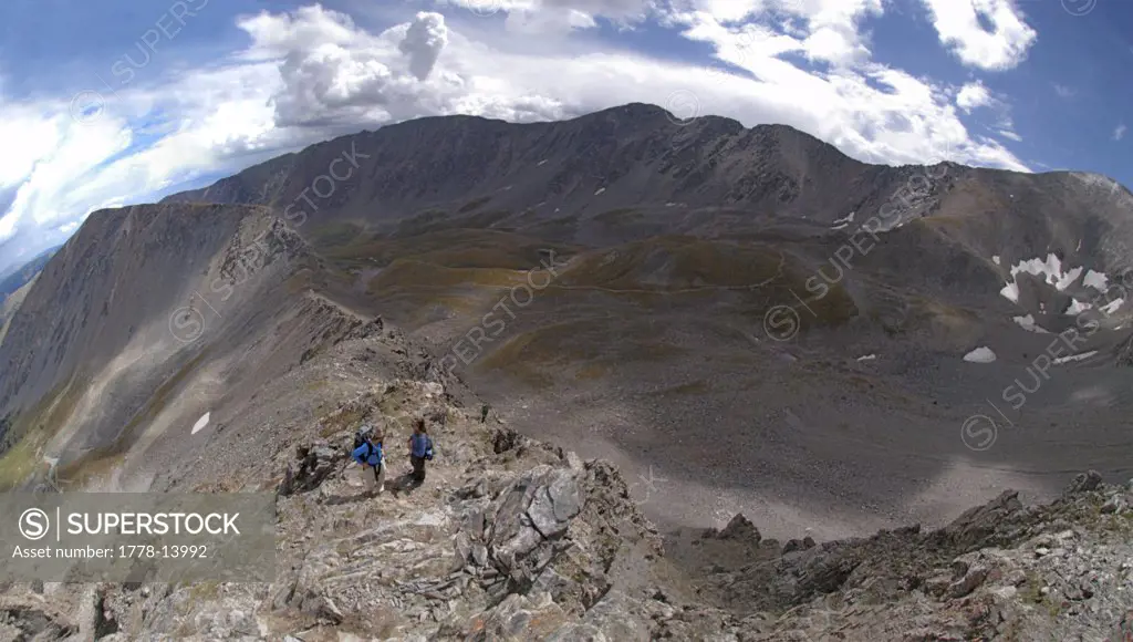 Two women climbing a Colorado mountain