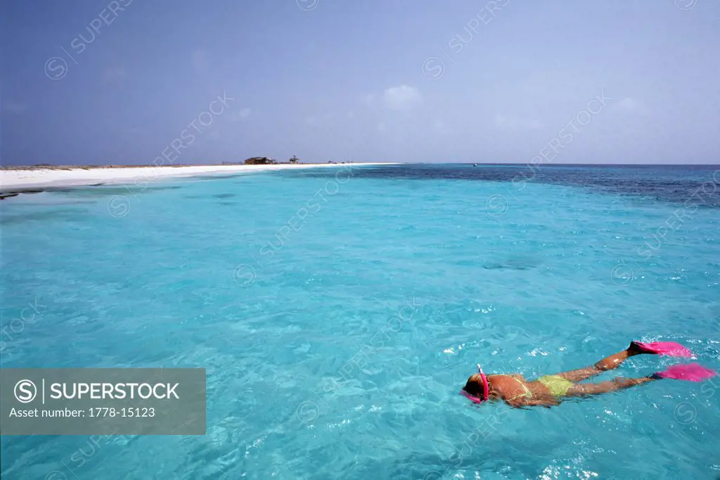 Female snorkeler on the surface near Klein Curacao, Netherlands Antilles