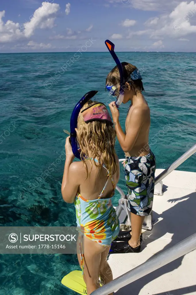 Two children ready to go snorkeling, New Providence, Bahamas