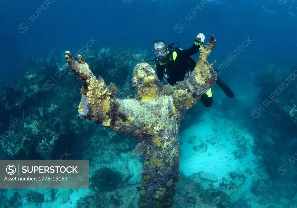 Scuba diver and Christ Statue, Key Largo, Florida