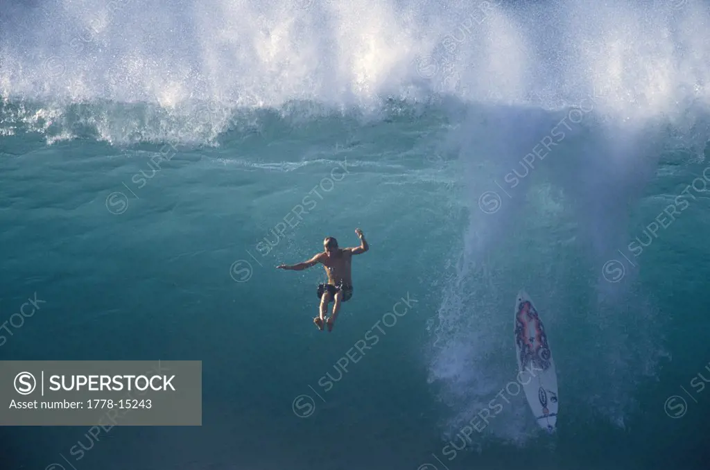 surfer wipeout at Backdoor Pipeline