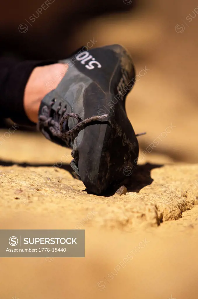 Climber's climbing shoe on a wall
