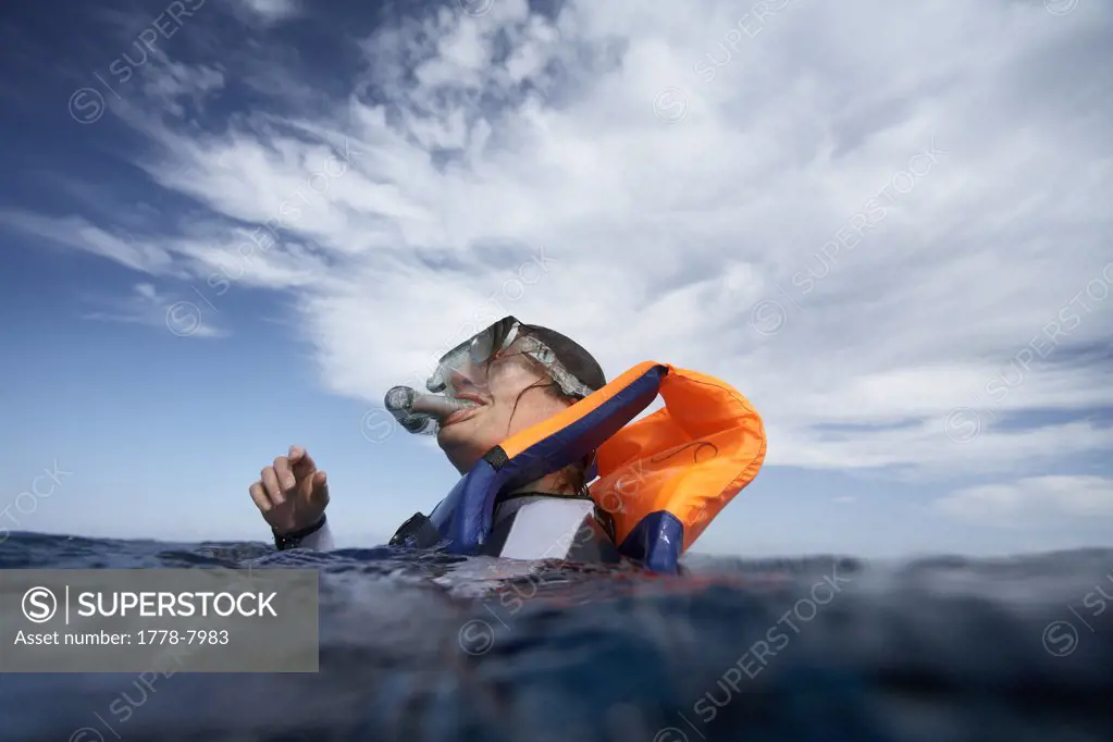 Snorkeler breaking the surface