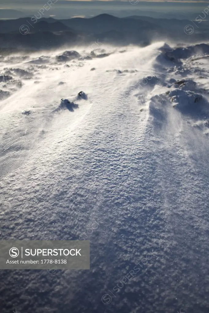 Details of rime ice and snow drifts on the summit of Mt Washington at sunrise in New Hampshire's White Mountains