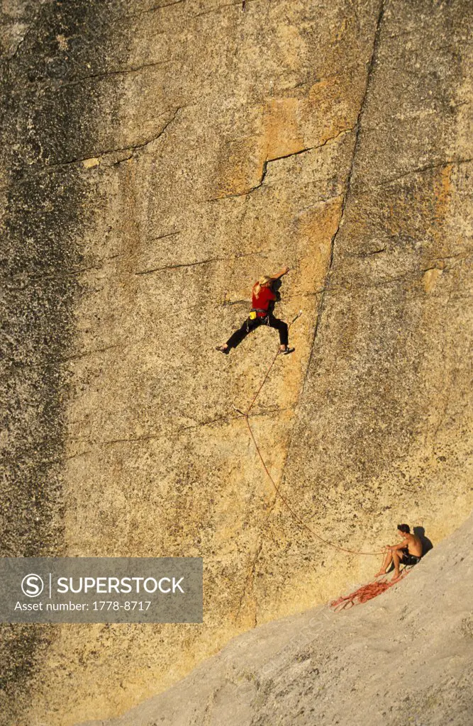 two men rock climbing  in Tuolumne Meadows  Yosemite National Park, California