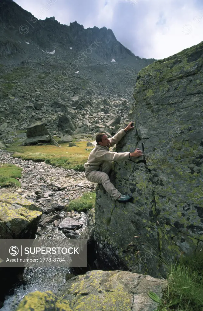 A man bouldering in Switzerland