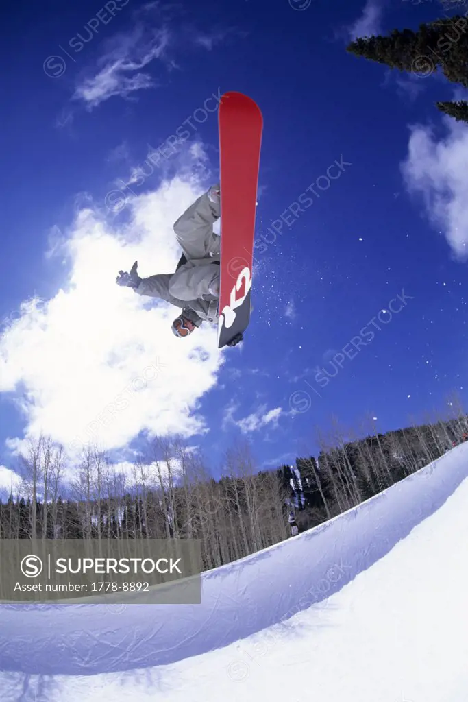 Male snowboarding at the Canyons, Utah