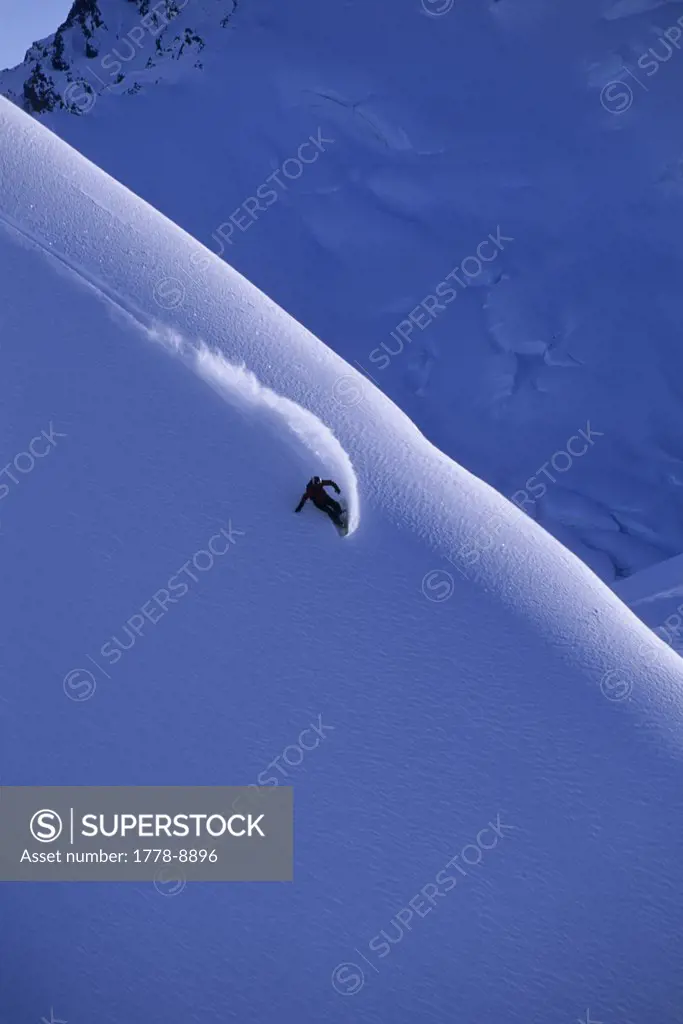 Female snowboarder in Valdez, Alaska