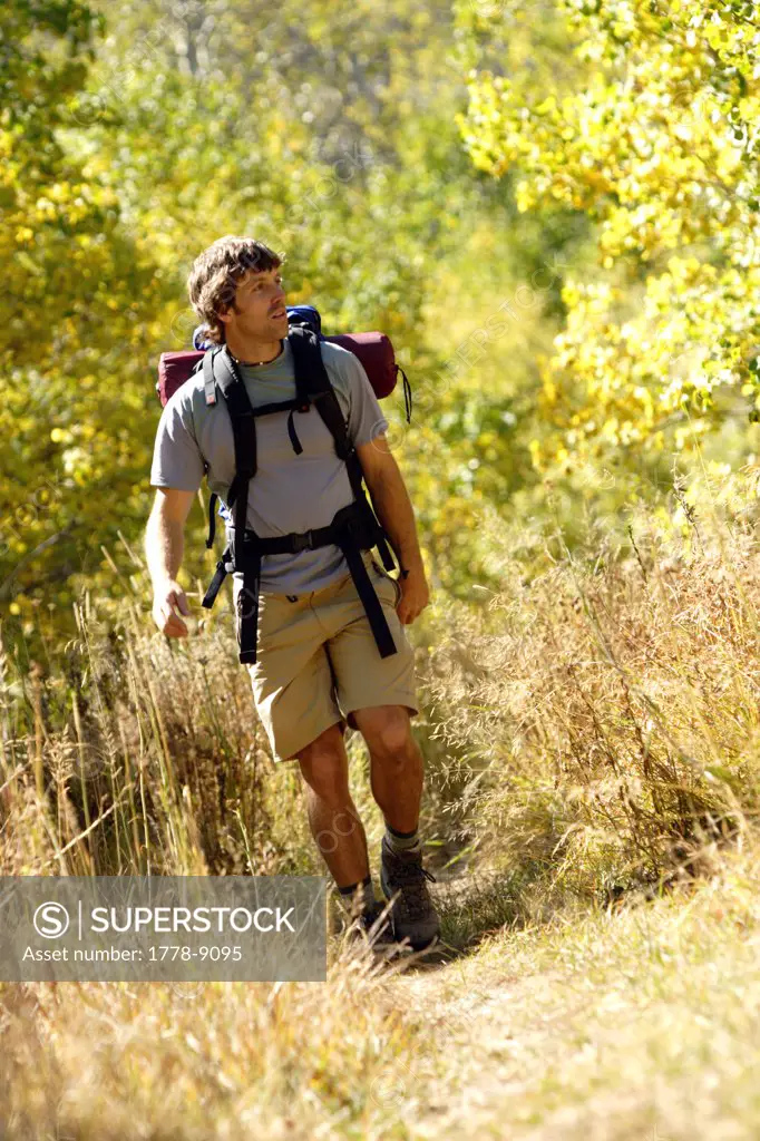 Young man backpacking near Fallen Leaf Lake, CA