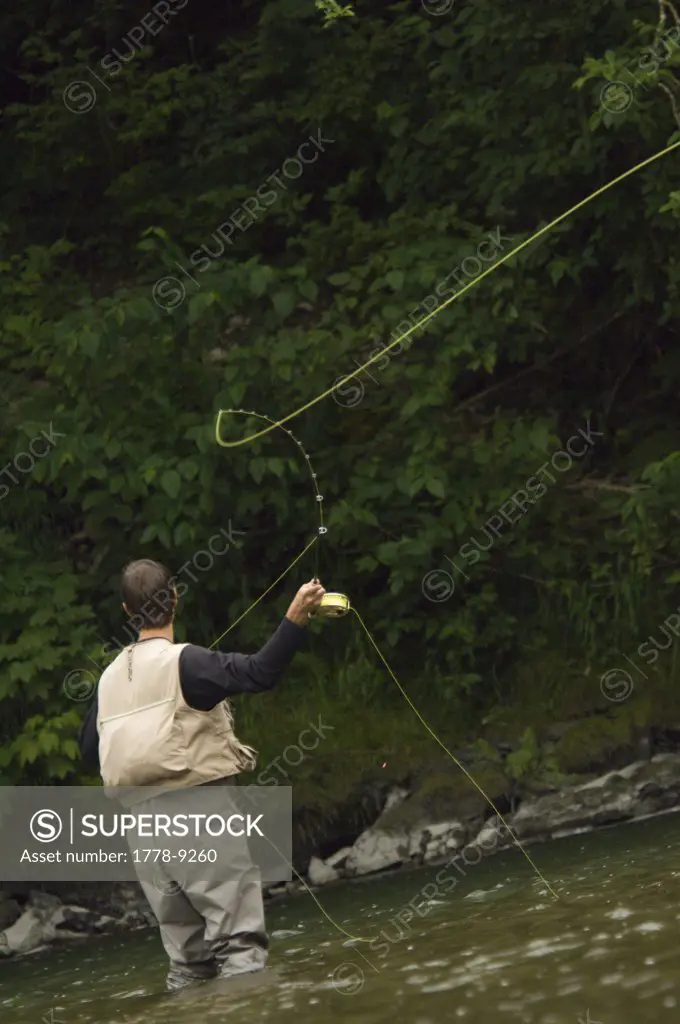 Solo male fly fishing in western Washington