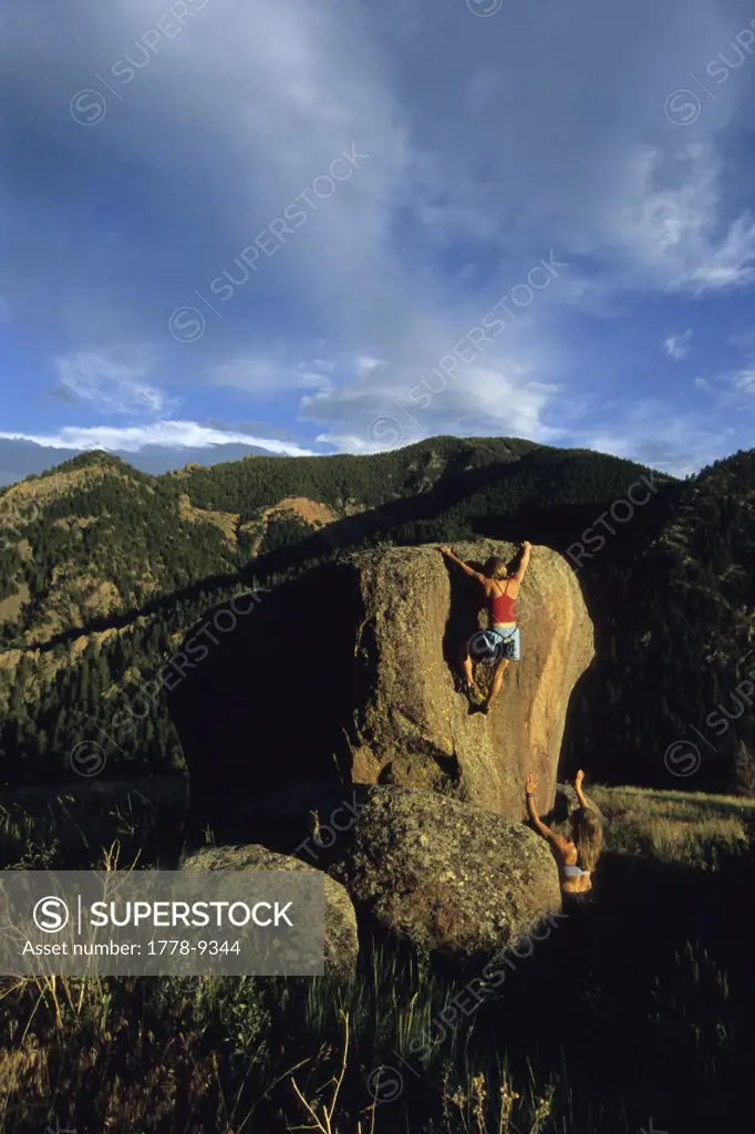 Two woman bouldering in Eldorado Canyon, Colorado