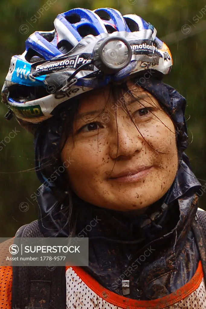 A woman wears her adventure racing equipment
