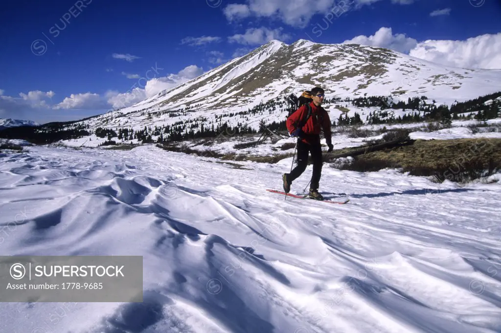 A man skis in the Rocky Mountain backcountry outside of Breckenridge, CO
