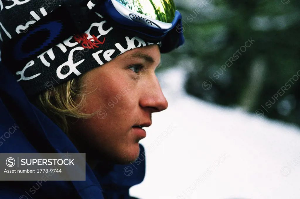 Pensive head shot of snowboarder