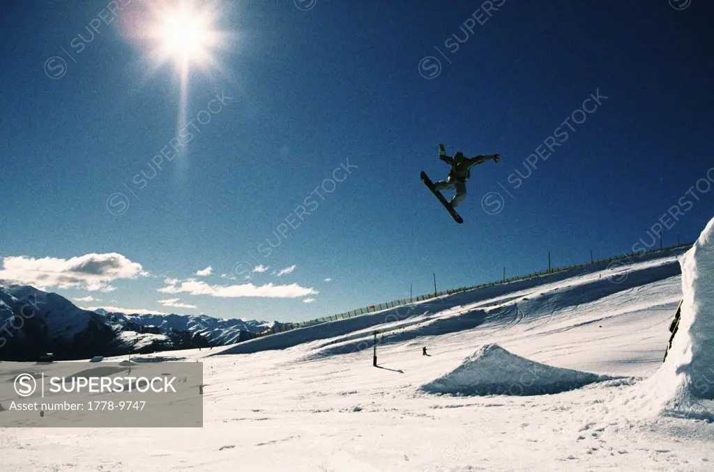 Big air in the snowboard park, out of control