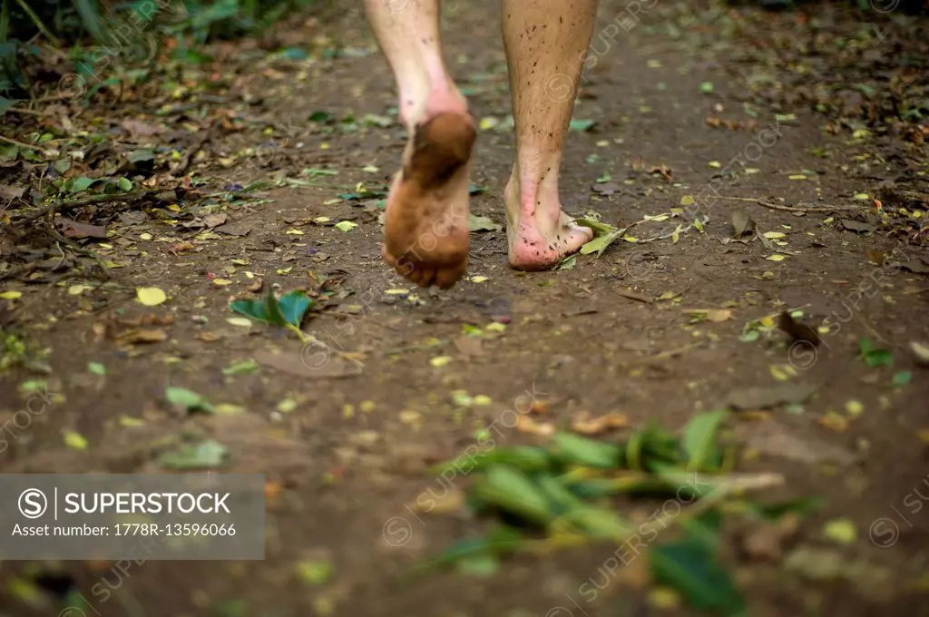 Walking down trail barefoot