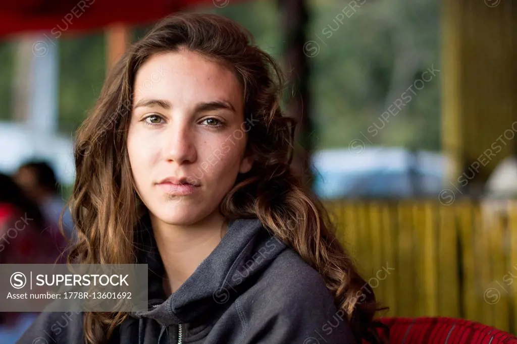 Portrait Of Young Attractive Female In A Restaurant At The Edges Of Lake Atitlan